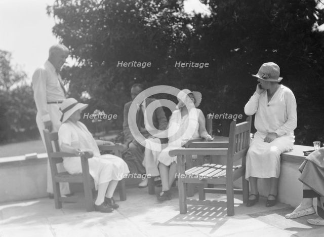 Group of people at "The Shallows," property of Lucien Hamilton Tyng, Southampton, Long Island, 1931  Creator: Arnold Genthe.