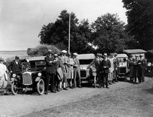 Group of people and cars on a country road, (c1930s?)