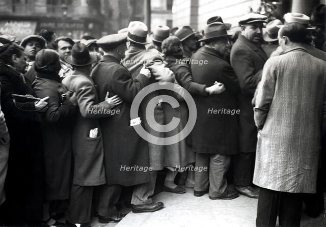 Group of people standing in line to visit the funeral chapel of Francesc Macia, president of the …