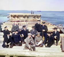 Group of railroad construction participants on the pier in Kem-Pristan, 1915. Creator: Sergey Mikhaylovich Prokudin-Gorsky
