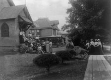 Group of women and a few boys outside Roycroft shop, East Aurora, N.Y., 1900. Creator: Frances Benjamin Johnston