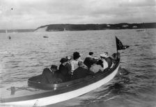 Group of well-dressed men and women in motorboat, Oyster Bay, Long Island, N.Y., 1905. Creator: Frances Benjamin Johnston