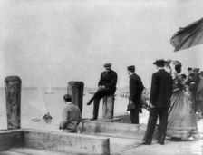 Group of well-dressed people on dock during yacht race, Oyster Bay, Long Island, N.Y., 1905. Creator: Frances Benjamin Johnston