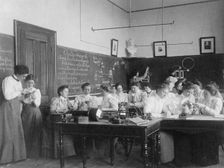 Group of young women studying electro-magnets in normal school, Washington, D.C., (1899?). Creator: Frances Benjamin Johnston