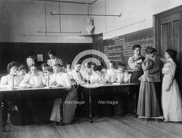Group of young women studying static electricity in normal school, Washington, D.C., (1899?). Creator: Frances Benjamin Johnston.