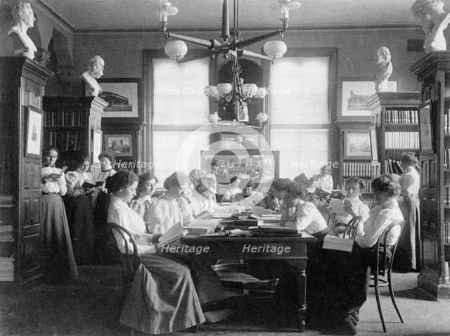 Group of young women reading in library of normal school, Washington, D.C., 1899. Creator: Frances Benjamin Johnston.