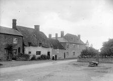 Group outside the Post Office, Coxwell, Oxfordshire, c1860-c1922. Artist: Henry Taunt