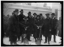 Group outside White House in snow, between 1913 and 1918. Creator: Harris & Ewing