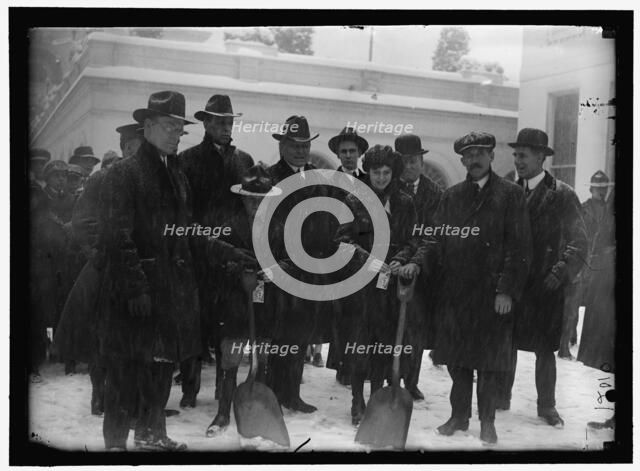Group outside White House in snow, between 1913 and 1918. Creator: Harris & Ewing.
