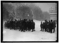 Group outside White House in snow, between 1913 and 1918. Creator: Harris & Ewing