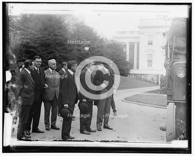 Group outside White House: includes Woodrow Wilson (right), and Newton..., between 1910 and 1920. Creator: Harris & Ewing.