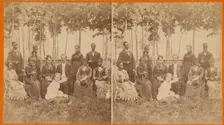 Group portrait in garden, 1870s. Creator: Alexander Carson McIntyre