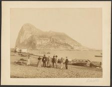Group portrait in front of Rock of Gibraltar, about 1880-1895. Creator: Unknown