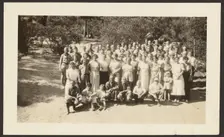 Group Portrait in Orchard, 1907-1943. Creator: Louis Fleckenstein