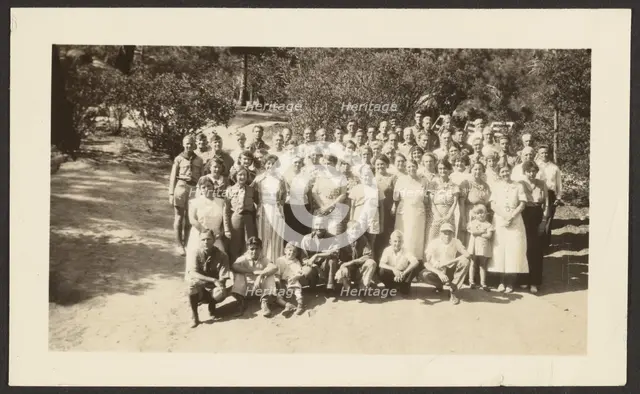 Group Portrait in Orchard, 1907-1943. Creator: Louis Fleckenstein.
