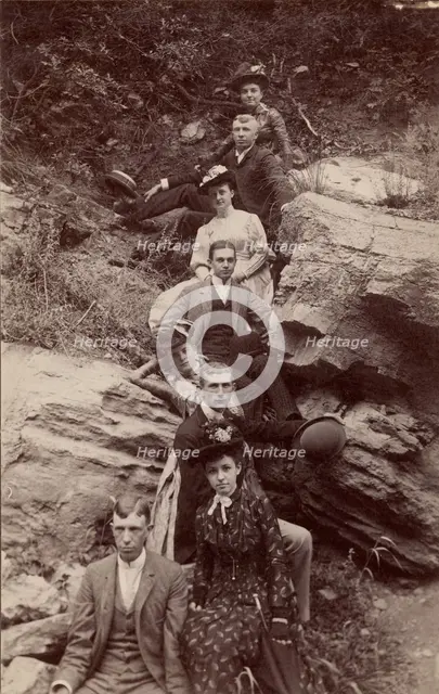 Group portrait on hillside, about 1880-1895. Creator: Unknown.