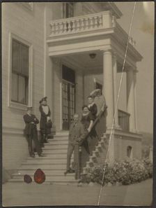 Group Portrait on Steps of Large House, 1907-1943. Creator: Louis Fleckenstein