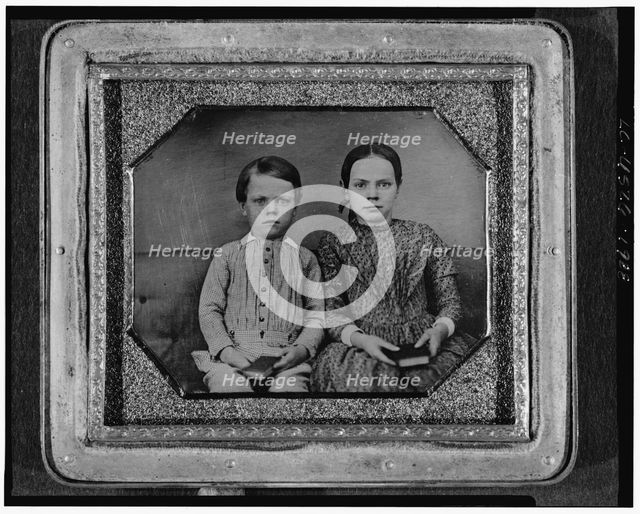Group portrait of an unidentified boy and girl, three-quarter length, seated..., between 1840 & 1860 Creator: Unknown.