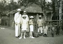 Group portrait of Europeans and locals, Sierra Leone, 20th century