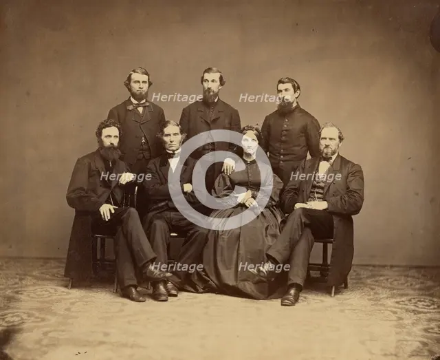 Group portrait of men and woman, about 1860-1869. Creator: Unknown.