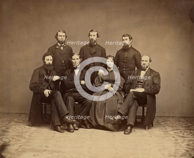 Group portrait of men and woman, about 1860-1869. Creator: Unknown.