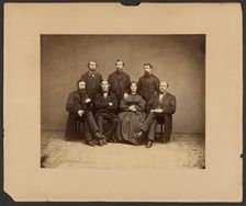 Group portrait of men and woman, about 1860-1869. Creator: Unknown
