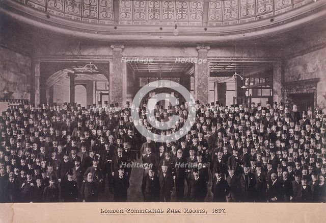 Group portrait of men in the London Commercial Sale Rooms, Mincing Lane, London, 1897. Artist: Anon