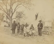 Group portrait of Native Americans, about 1865-1870. Creator: Unknown