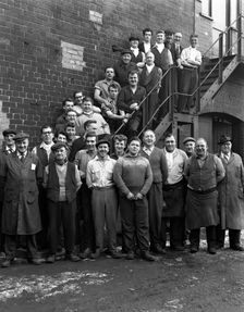 Group portrait of workers, Edgar Allen's steel foundry, Sheffield, South Yorkshire, 1963. Creator: Michael Walters
