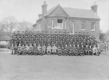 Group portrait of wardens, c1935. Creator: Kirk & Sons of Cowes