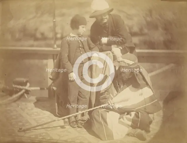 Group Portrait of Two Occidental Men and a Boy on a Boat in the Nile River, 1865. Creator: Théodule Deveria.