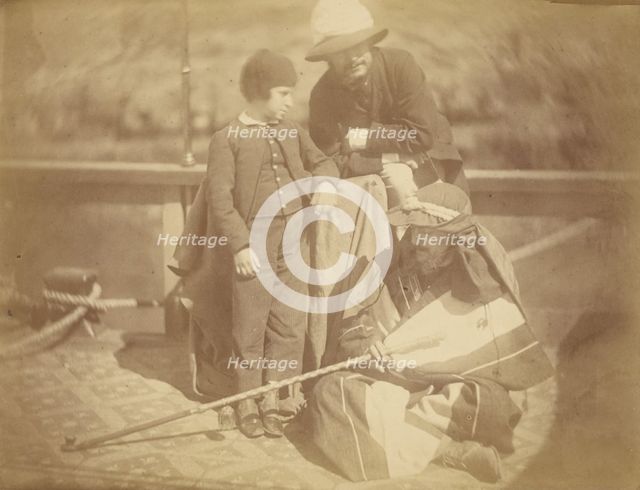 Group Portrait of Two Occidental Men and a Boy on a Boat in the Nile River, 1865. Creator: Théodule Deveria.