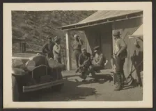 Group Portrait Outside Building, 1907-1943. Creator: Louis Fleckenstein