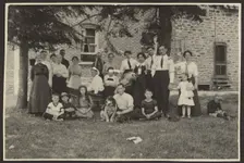Group Portrait Outside Building, 1907-1943. Creator: Louis Fleckenstein
