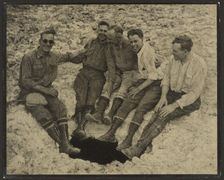 Group Portrait Seated at Mouth of Vertical Cave, San Jacinto Peak, 1930. Creator: Louis Fleckenstein