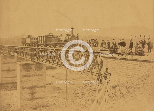 Group portrait with train on bridge, 1865. Creator: Altobelli & Molins.