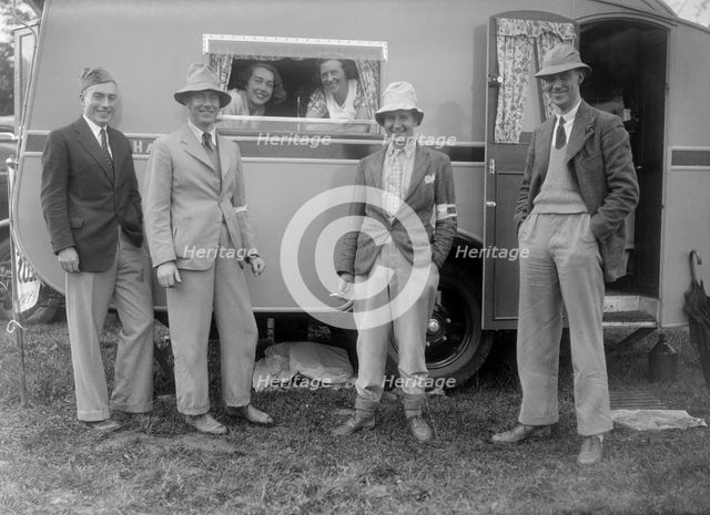 Group portrat at Shelsley Walsh, Worcestershire, during the Blackpool Rally, 1937.  Artist: Bill Brunell.