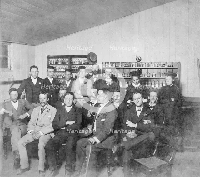 Group posed photo in classroom with Dr Wilton W.R. Love with Chemistry/Pharmacy students, 1894. Creator: Unknown.