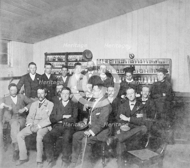 Group posed photo in classroom with Dr Wilton W.R. Love with Chemistry/Pharmacy students, 1894. Creator: Unknown.