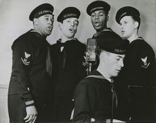 Group photograph of the U.S. Coast Guard Quartet members while singing, New York, N.Y., 1939 - 1945. Creator: Naval Photographic Center