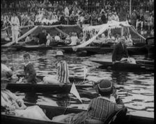 Groups of People Picnicking in Punts at Boulter's Lock, Maidenhead, 1926. Creator: British Pathe Ltd
