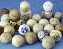 Gutta percha and rubber-core golf balls, c1920. Creators: Spalding, Dunlop Rubber Company, Slazenger