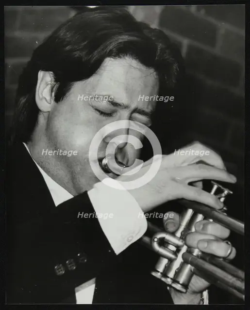 Guy Barker playing the trumpet at The Fairway, Welwyn Garden City, Hertfordshire, 3 November 1991. Creator: Denis Williams.