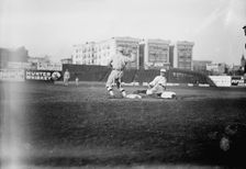 Guy Zinn, New York AL, sliding back into first base against Boston at Hilltop Park..., 1912. Creator: Bain News Service