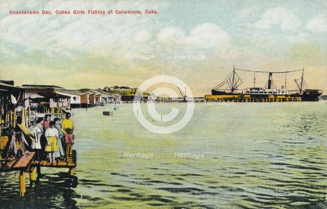'Guantanamo Bay, Cuban Girls Fishing at Caimanera, Cuba', c1910. Artist: Unknown.