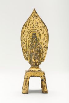 Guanyin (Avalokiteshvara) Standing before Flaming Aureole and Holding a Water..., mid-5th cent. Creator: Unknown
