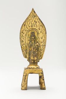 Guanyin (Avalokiteshvara) Standing before Flaming Aureole and Holding a Water..., mid-5th cent. Creator: Unknown