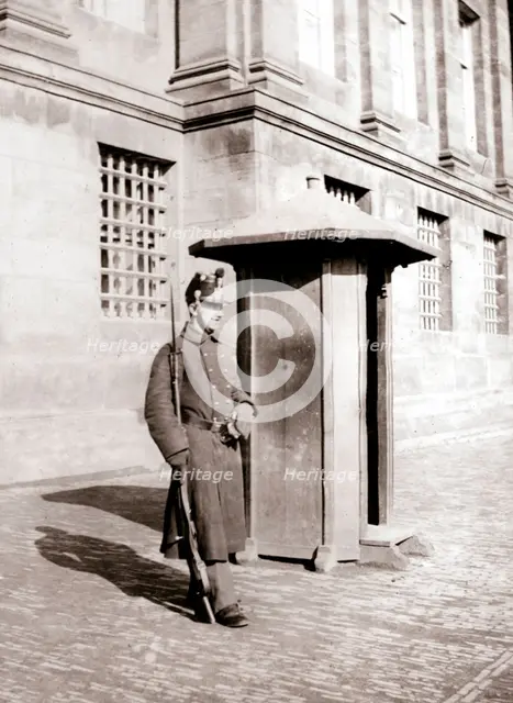 Guard, Brussels, 1898.Artist: James Batkin