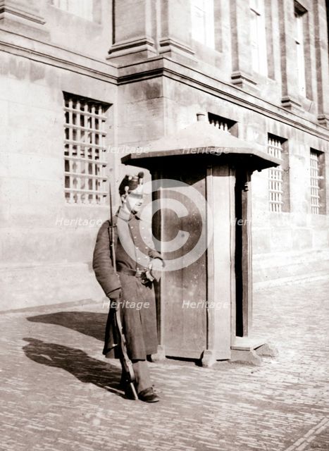 Guard, Brussels, 1898.Artist: James Batkin