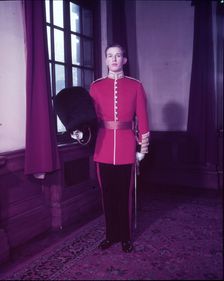 Guards officer in full dress uniform, London, c1953. Creator: Arthur Charles Kirby Ware